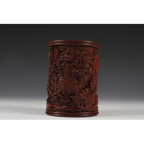 77 - A Chinese Wooden Brush Pot with Decoration of Trees and People. 

Height: Approximately 12cm
Length:... 