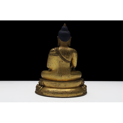 253 - A Fine Tibetan or Nepalese Bronze Gilt Buddhist Statue from the 18-19th Century.

H: Approximately 1... 