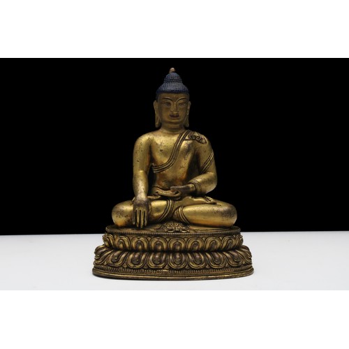 253 - A Fine Tibetan or Nepalese Bronze Gilt Buddhist Statue from the 18-19th Century.

H: Approximately 1... 