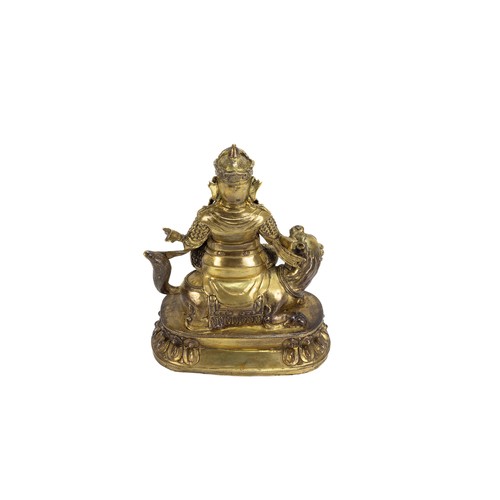 256 - A Tibetan Buddha Statue in the Form of Jambhala from the 19th Century.

H: Approximately 22cm