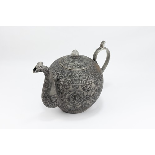 162 - An Indo-Persian Copper Tea Pot with Intricate Carvings of Floral Patterns, Animals and Islamic Calli... 