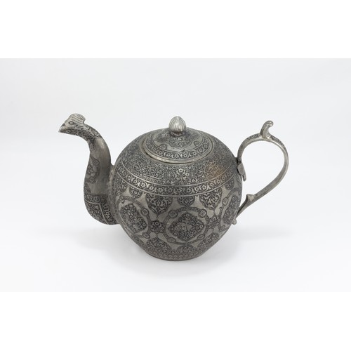 162 - An Indo-Persian Copper Tea Pot with Intricate Carvings of Floral Patterns, Animals and Islamic Calli... 