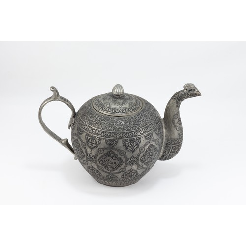 162 - An Indo-Persian Copper Tea Pot with Intricate Carvings of Floral Patterns, Animals and Islamic Calli... 