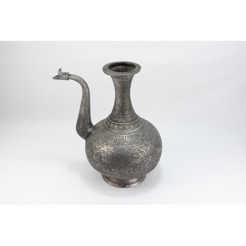 163 - An Islamic Middle Eastern Copper Water Jug with Intricate Carvings of Floral Patterns, Animals and I... 