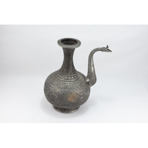 163 - An Islamic Middle Eastern Copper Water Jug with Intricate Carvings of Floral Patterns, Animals and I... 