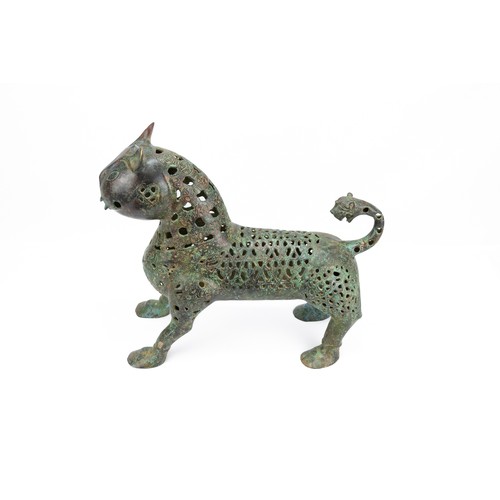 175 - An Islamic Bronze Incense Burner in the Figure of a Lion.

H: Approximately 27cm
L: Approximately 31... 