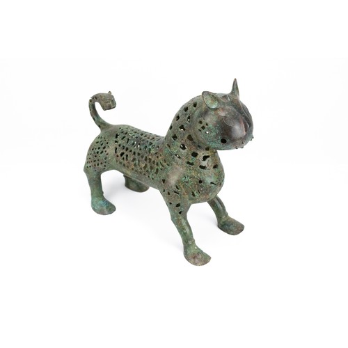 175 - An Islamic Bronze Incense Burner in the Figure of a Lion.

H: Approximately 27cm
L: Approximately 31... 