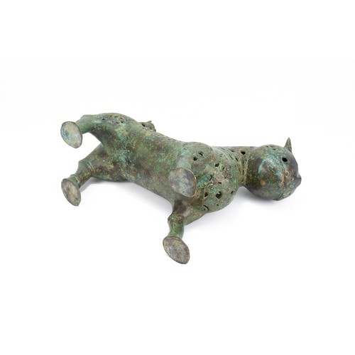 175 - An Islamic Bronze Incense Burner in the Figure of a Lion.

H: Approximately 27cm
L: Approximately 31... 