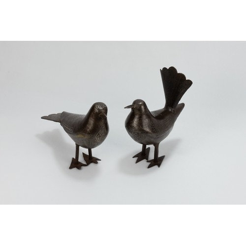 176 - A Pair of Islamic Qajar Iron Figures of Birds with Intricate Carvings.

H: Approximately 12cm