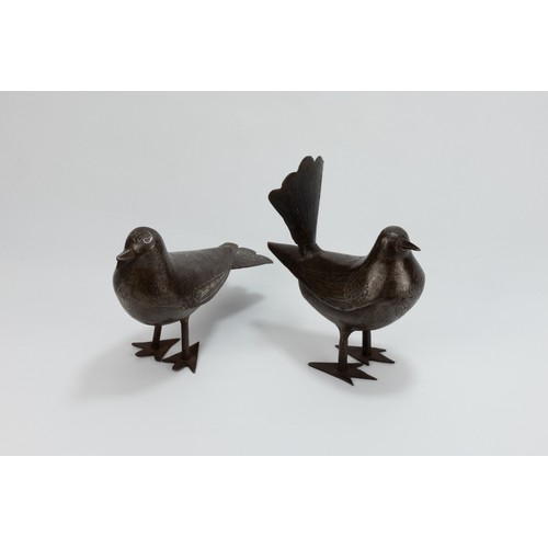 176 - A Pair of Islamic Qajar Iron Figures of Birds with Intricate Carvings.

H: Approximately 12cm