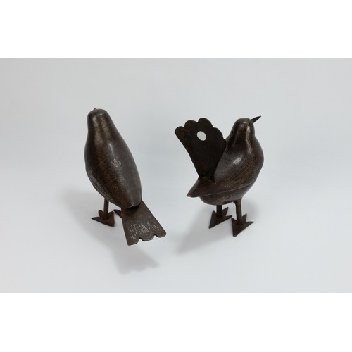 176 - A Pair of Islamic Qajar Iron Figures of Birds with Intricate Carvings.

H: Approximately 12cm