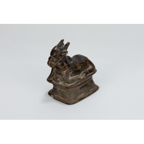 118 - An Indian Copper Figure of Nandi Sacred Cow from the 19th Century.

H: Approximately 9cm