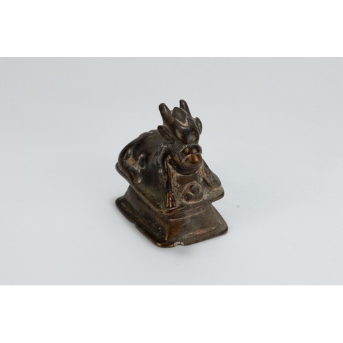 118 - An Indian Copper Figure of Nandi Sacred Cow from the 19th Century.

H: Approximately 9cm