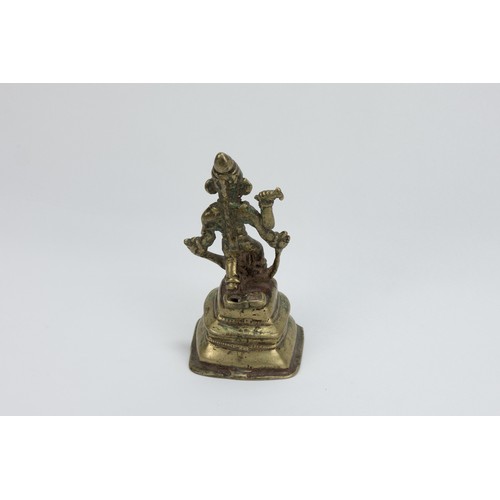 119 - An Indian Bronze Buddha from the 19th Century.

H: Approximately 13cm