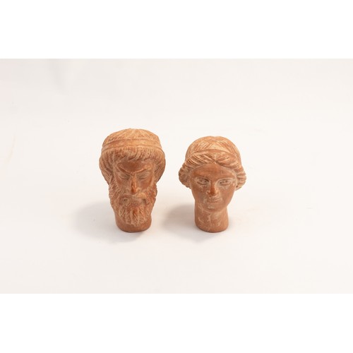 279 - A Lot of 2 Terracotta Figures of a Man & Woman's Head Possibly Ancient.

H: Approximately 7.5 -8.2cm