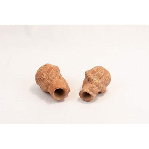 279 - A Lot of 2 Terracotta Figures of a Man & Woman's Head Possibly Ancient.

H: Approximately 7.5 -8.2cm