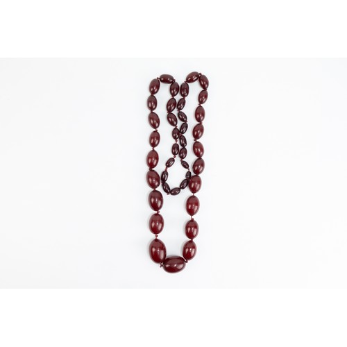 38 - A Graduated Cherry Amber Beads Necklace.

100g