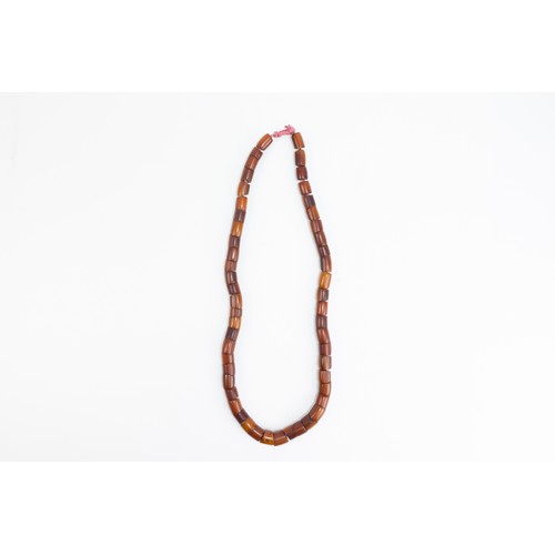 41 - A Tribal Yemeni Amber Coloured Beads Necklace.

53g