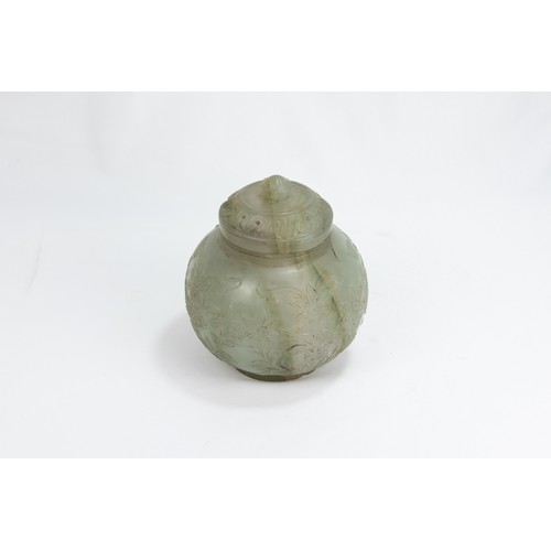 121 - An Indian Mughal Style Jade Sugar Pot with a Lid Decorated with Floral Patterned Carvings.

H: Appro... 