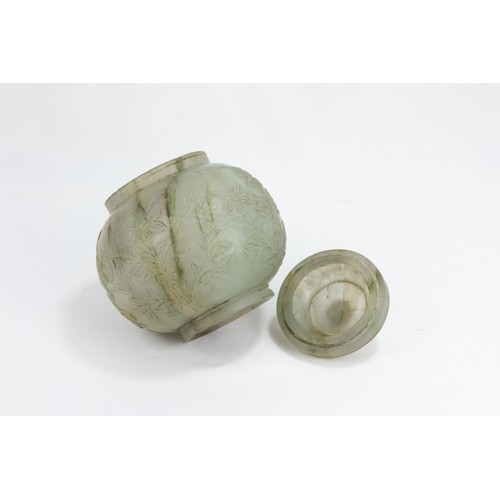 121 - An Indian Mughal Style Jade Sugar Pot with a Lid Decorated with Floral Patterned Carvings.

H: Appro... 