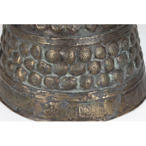 191 - An Islamic Khorasan Bronze Candle Stand from the 12th Century Decorated with Intricate Carvings of K... 