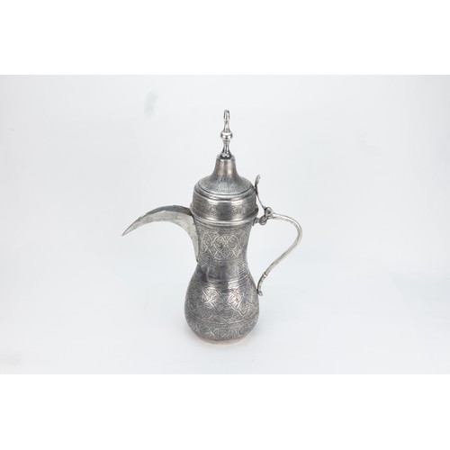 194 - An Islamic Middle Eastern Silver-Tested Coffee Pot

H: Approximately 32.5cm
600g