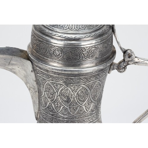 194 - An Islamic Middle Eastern Silver-Tested Coffee Pot

H: Approximately 32.5cm
600g