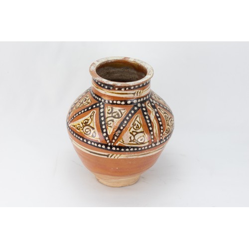 197 - An Islamic Samanid Pottery Jar from the 10-11th Century Decorated with Enamel Work.

H: Approximatel... 