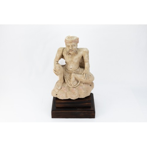 284 - A Buddhist Plaster Seated Figure of a Man Sitting from the 19th Century.

With Stand H: Approximatel... 