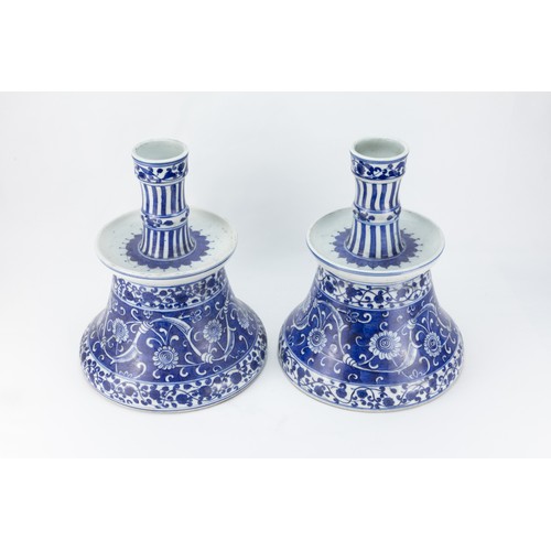 201 - A Pair of Islamic Iznik Style Blue & White Porcelain Candlesticks Depicting Floral Patterns.

H: App... 