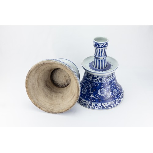 201 - A Pair of Islamic Iznik Style Blue & White Porcelain Candlesticks Depicting Floral Patterns.

H: App... 