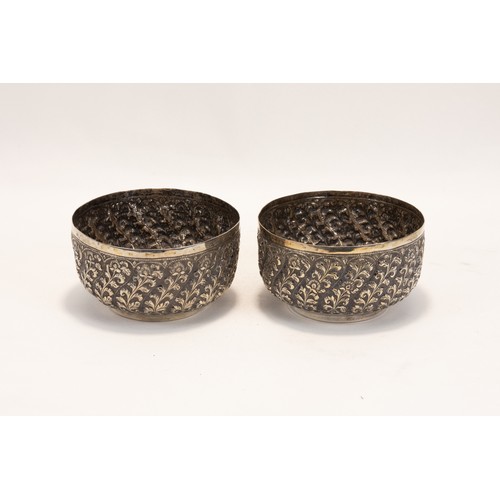 130 - A Pair of Indian Silver Bowls Decorated with Floral Patterns.

D: Approximately 9.8cm
H: Approximate... 