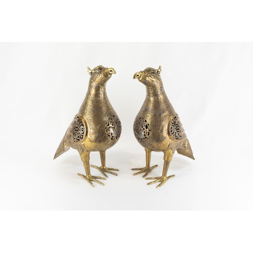 211 - A Pair of Islamic Bronze Birds Decorated with Kufic Inspirations and Floral Patterns in Silver Inlay... 