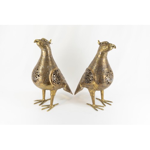 211 - A Pair of Islamic Bronze Birds Decorated with Kufic Inspirations and Floral Patterns in Silver Inlay... 