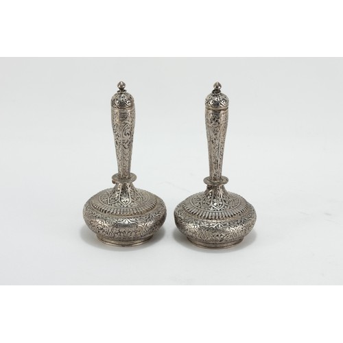 135 - A Pair of Silver Indian or Kashmiri Tested Silver Rosewater Sprinklers.

H: Approximately 12.5cm
144... 