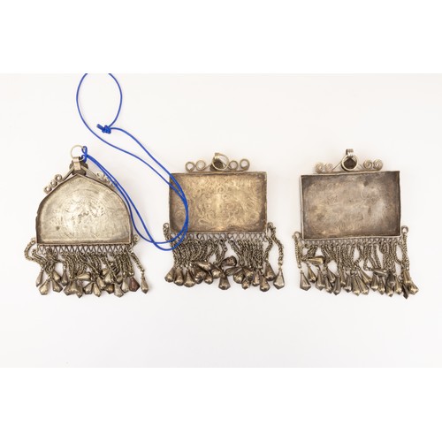 56 - A Lot of 3 Turkmen Low Grade Silver Pendants Decorated with Red Glass.

L: Approximately 7.8cm, 8.5c... 