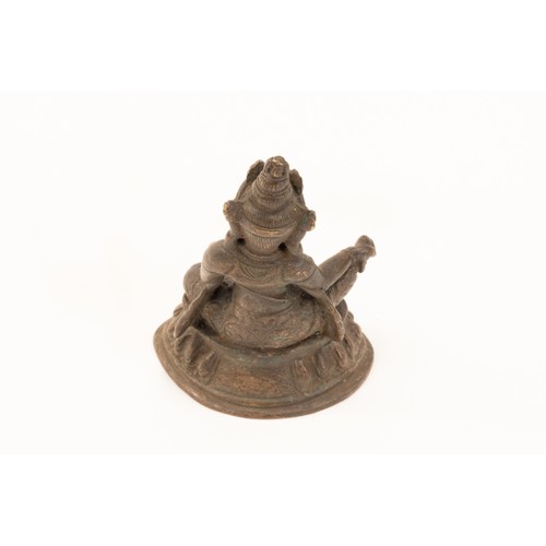 265 - A Tibetan Bronze Buddhist Figure of Jambhala from the 19th Century.

H: Approximately 10cm