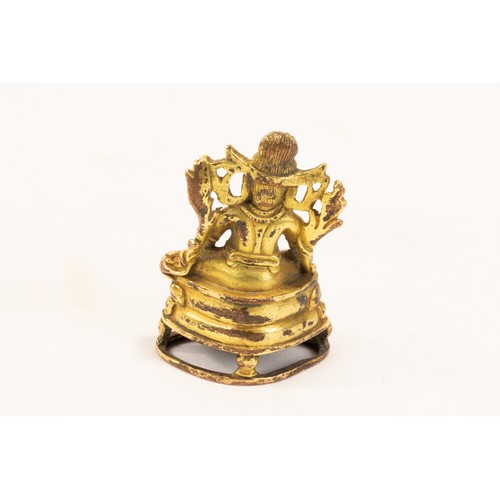 266 - A Tibetan Bronze Gilted Buddhist Figure of Mahasiddha from the 19th Century.

H: Approximately 6.5cm