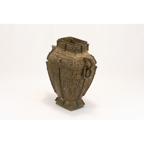 96 - An Archaic Chinese Style Wine Vessel Decorated with Animal Carvings.

H: Approximately 35cm