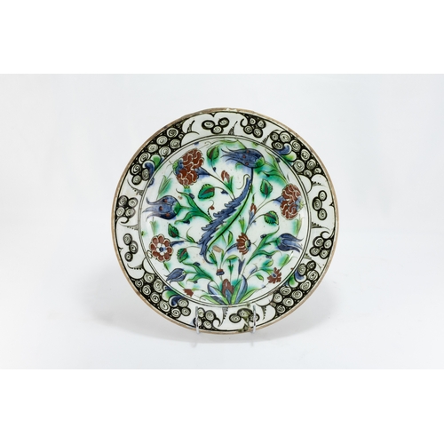 226 - An Islamic Iznic Dish Depicting Multicoloured Floral Patterns from the 18th Century.

D: Approximate... 