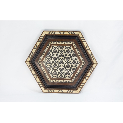 229 - An Islamic Damascus Mother of Pearl Inlaid Table from the 20th Century.

D: Approximately 39cm