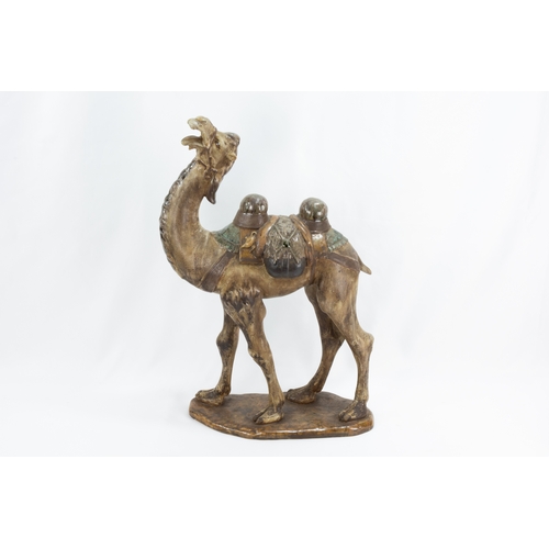 102 - A Chinese Ceramic Figure of a Camel from the 19th Century.

H: Approximately 46cm