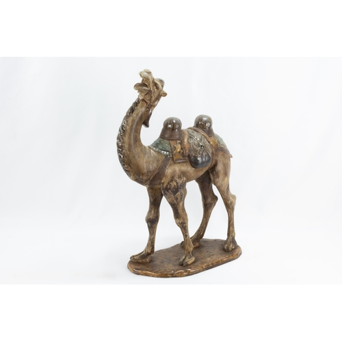 102 - A Chinese Ceramic Figure of a Camel from the 19th Century.

H: Approximately 46cm