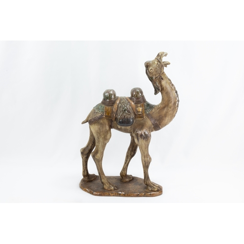 102 - A Chinese Ceramic Figure of a Camel from the 19th Century.

H: Approximately 46cm