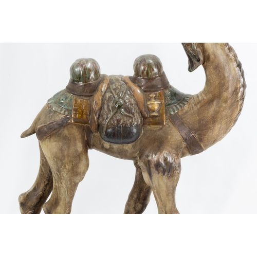 102 - A Chinese Ceramic Figure of a Camel from the 19th Century.

H: Approximately 46cm