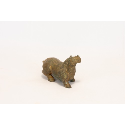 106 - **NO RESERVE**
A Chinese Bronze Figure of a Rhino.

L: Approximately 8.5cm