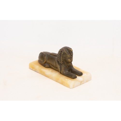 252 - **NO RESERVE**
An Egyptian Bronze & Alabaster Figure of a Sphinx.

Approximately 13.8x7x7.8cm