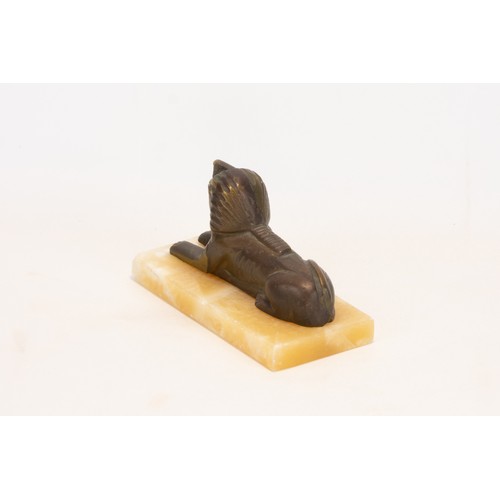 252 - **NO RESERVE**
An Egyptian Bronze & Alabaster Figure of a Sphinx.

Approximately 13.8x7x7.8cm