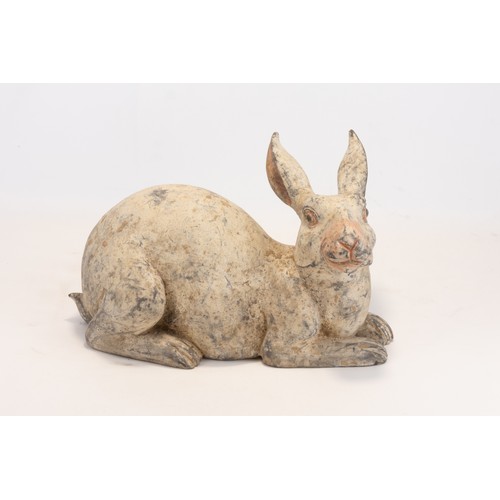 109 - A Chinese Terracotta Figure of a Rabbit from the Han Dynasty.

L: Approximately 27cm
H: Approximatel... 