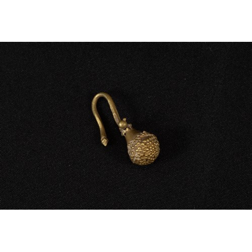 314 - A Near Eastern Gold Ornate Bead Earring Circa 1st Millennium B.C.

Approximately 2.1x1.0cm (Includin... 